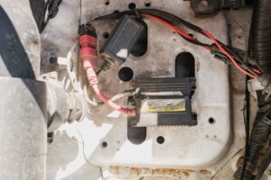 car battery cost new battery under hood